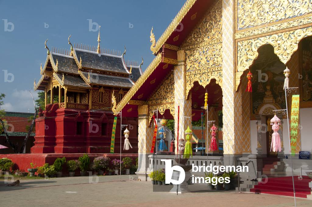 Thailand: Ho Trai or library building and main viharn at Wat Phrathat Haripunchai, Lamphun