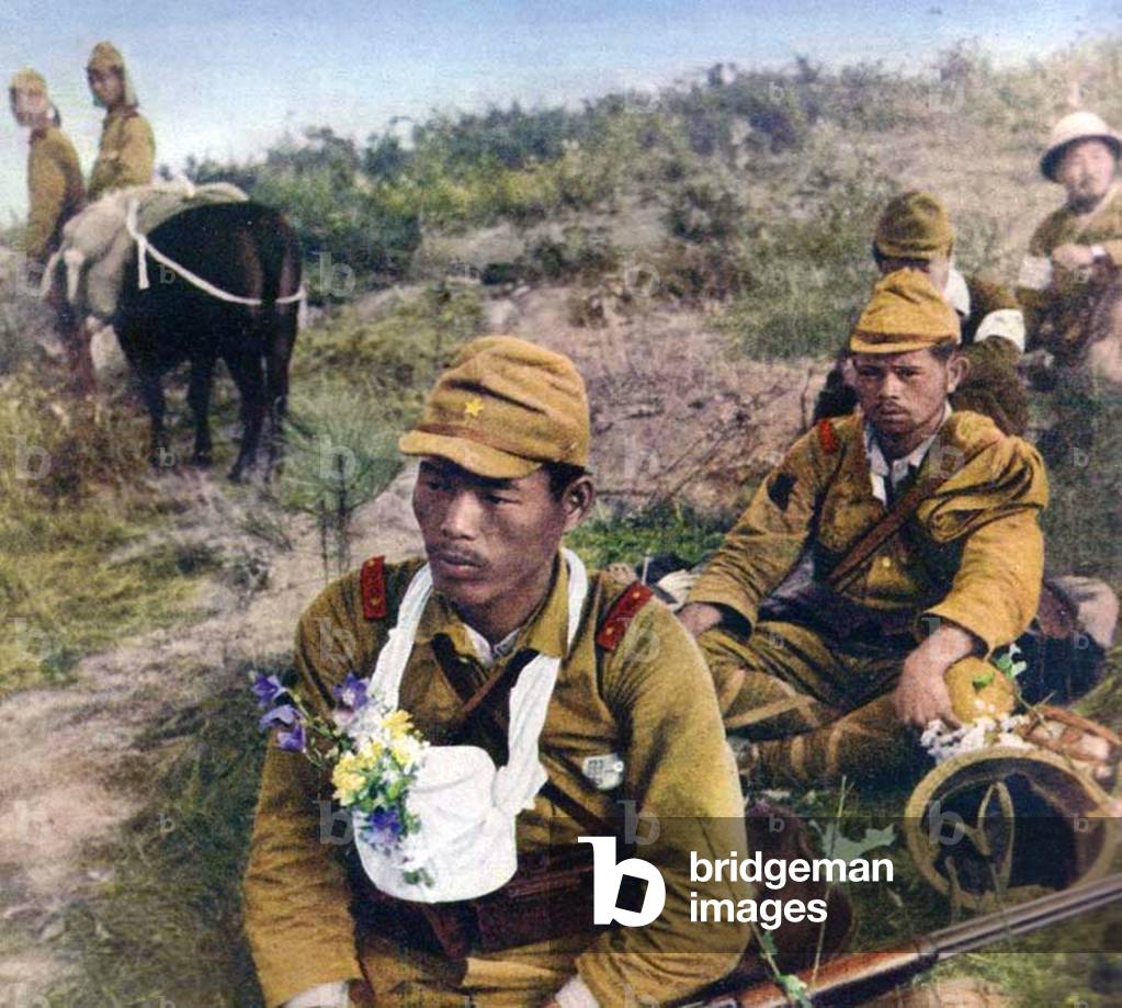 China: Second Sino-Japanese War (1937-1945). A Japanese soldier carries the ashes of a fallen comrade, north China, 1938.