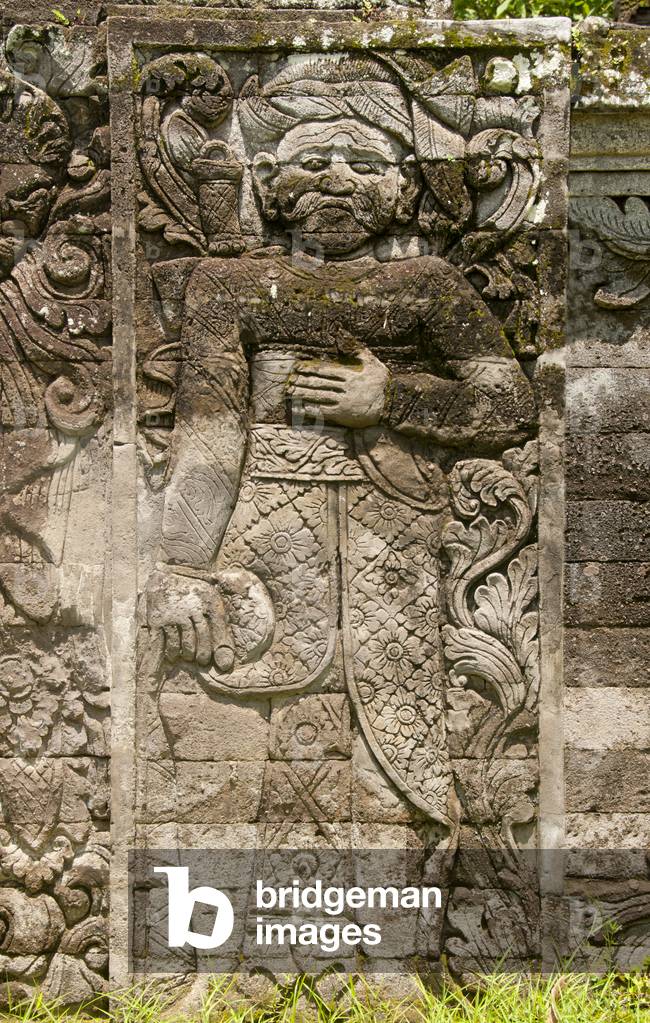 Indonesia: Carved relief of a local priest at the 19th century Pura Meduwe Karang Hindu temple, Kubutambahan, northern Bali
