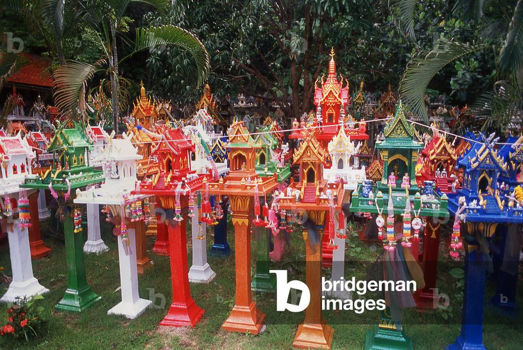 Thailand: Spirit houses line the road on the border between Chiang Mai and Lampang provinces, set up here to protect motorists on a dangerous stretch of road
