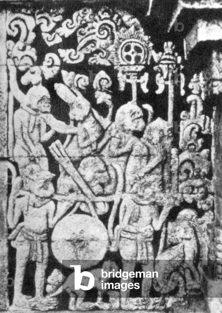 Indonesia: From a 14th-century relief at the Javanese temple Candi Panataran, this scene from the Ramayana shows the monkey king Sugiwa's army carrying a large gong