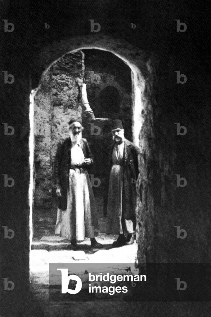 Palestine: Two Jewish elders in a Hebron / Al-Khalil passageway, early 20th century