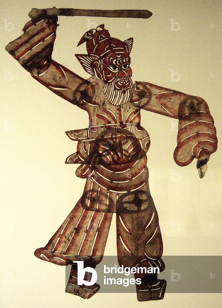 China: The demon-hunter Zhong Kui portrayed as a shadow puppet, Beijing Shadow Puppet Theatre, early 20th century