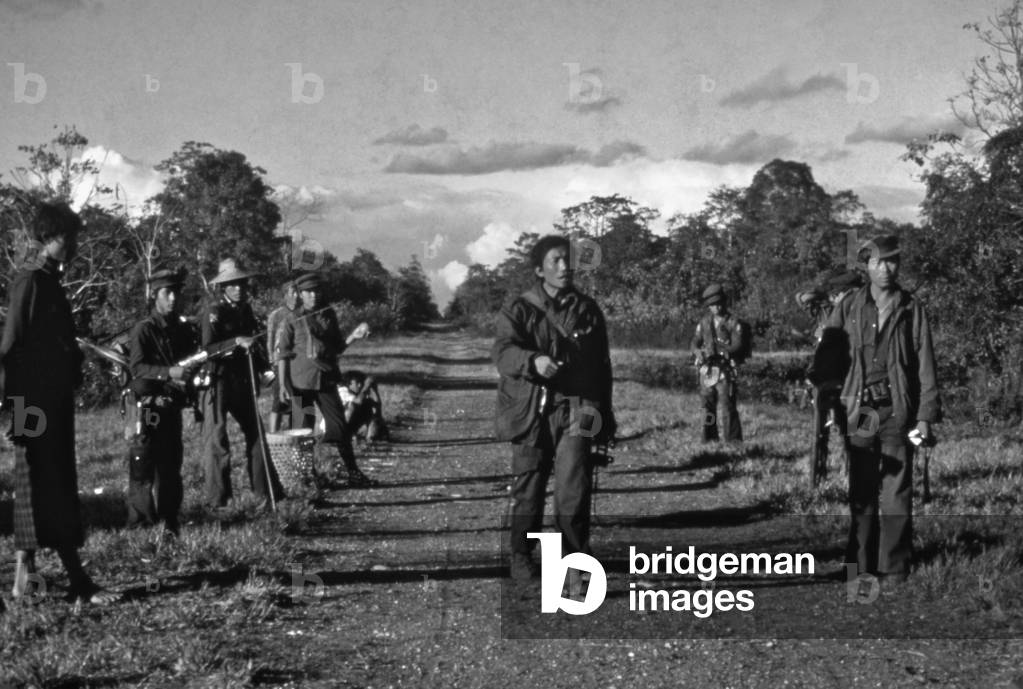 Burma / Myanmar: Major Pan Awng with his Kachin Independence Army (KIA) troops on the Ledo Road (c. 1985)