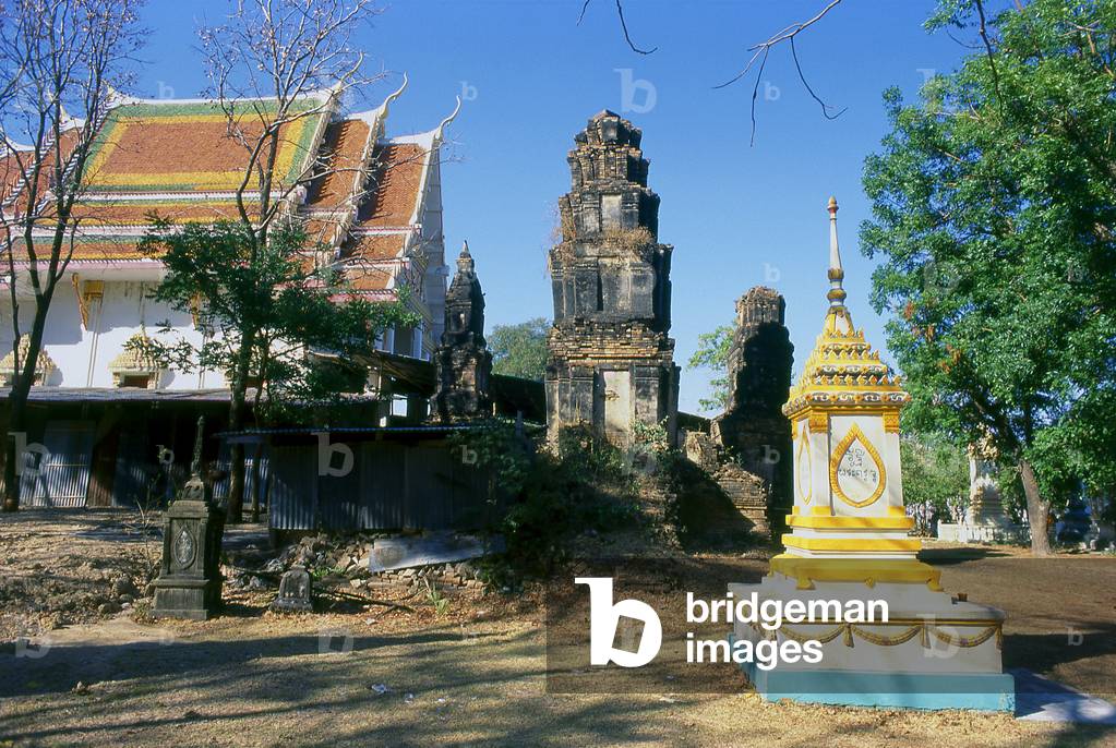 Thailand: The Khmer ruins of Prasat Muang Thi sit in front of the modern day temple of the same name, Surin Province, Northeast Thailand