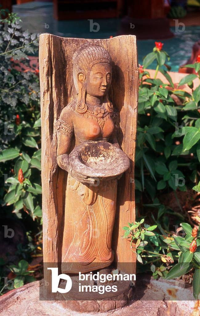 Thailand: Female figure in the grounds of Wat Lok Moli, Chiang Mai, northern Thailand