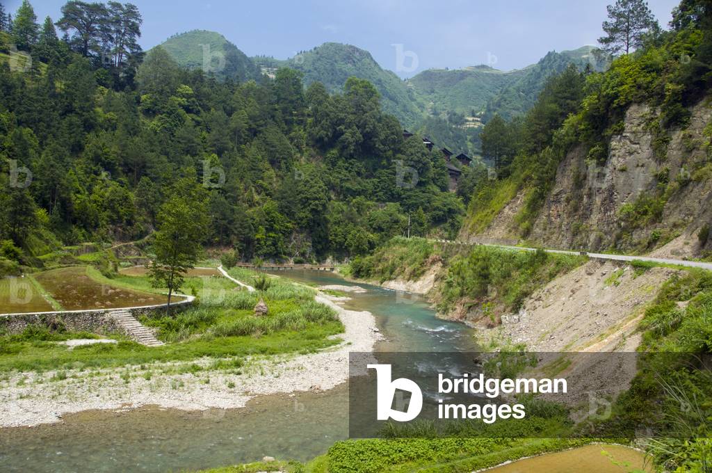 China: Ricefields and the road leading to the Miao village of Langde Shang, southeast of Kaili, Guizhou Province