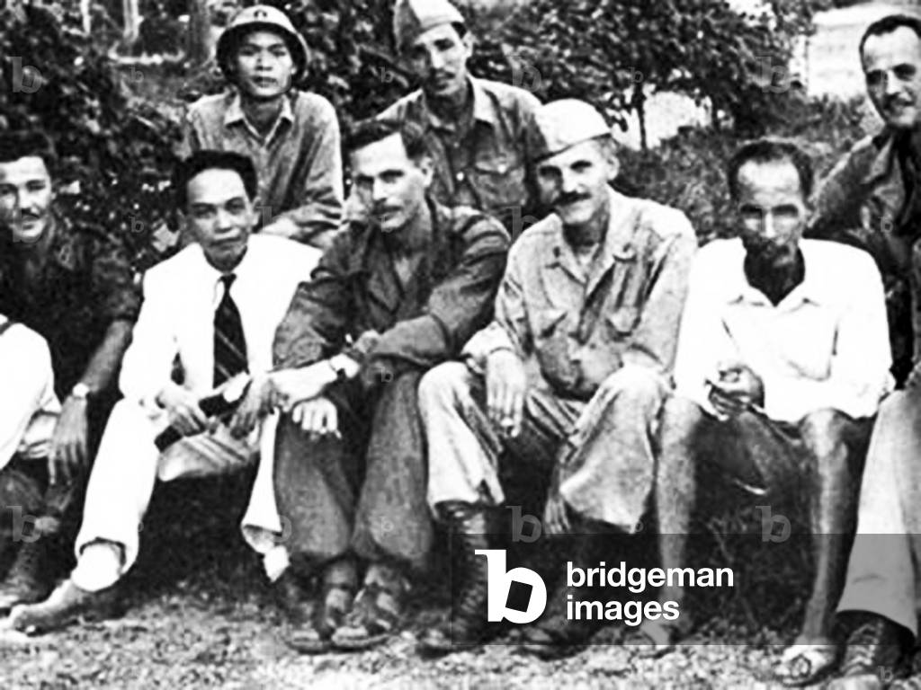 Vietnam: Indistinct but historically significant pictures of Vo Nguyen Giap and Ho Chi Minh with American OSS officers including Lieutenant Colonel Peter Dewey, OSS Vietnam (centre), c. 1945