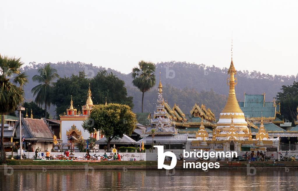 Thailand: Late afternoon light on Wat Chong Kham (Jong Kham) and Wat Chong Klang (Jong Klang) across Chong Kham (Jong Kham) Lake, Mae Hong Son, northern Thailand