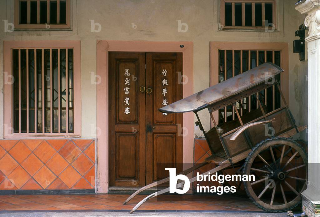 Malaysia: Traditional Peranakan house front with old cart, Malacca