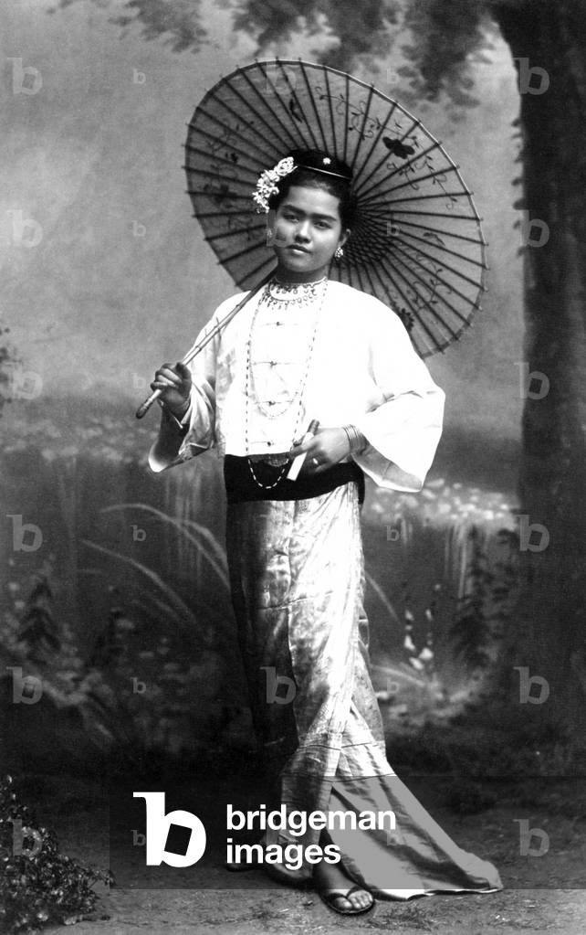 Burma / Myanmar: Studio portrait of a young Burman woman with a parasol, probably Rangoon / Yangon, 1895