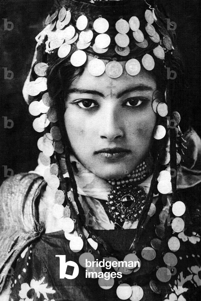 Algeria: Young Berber woman of the Ouled Nail tribe, early 20th century