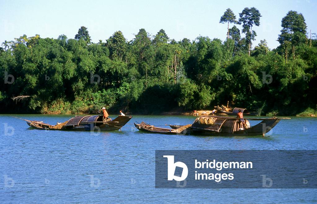 Vietnam: Boats transporting goods on the Song Huong or Perfume River, Hue