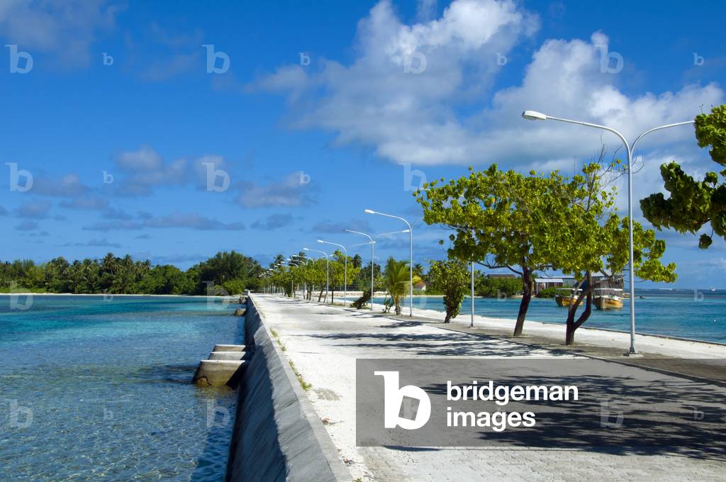 Maldives: Looking towards Gan Island. The causeways linking the islands of Addu Atoll (Seenu Atoll) create strong currents around the pillions they are built on, this has upset the ecology of the inner atoll close to the causeways