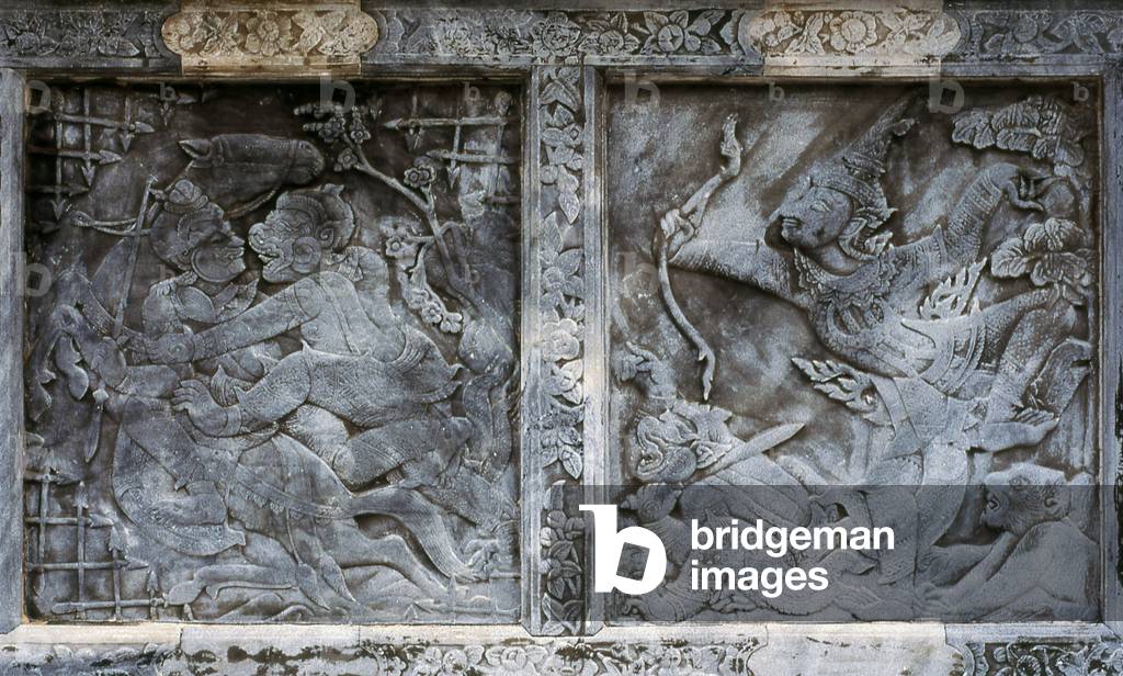 Thailand: A scene from the Ramakien (the Thai Ramayana story) on stone around the Phra Ubosot (Main Chapel), Wat Pho (Temple of the Reclining Buddha), Bangkok