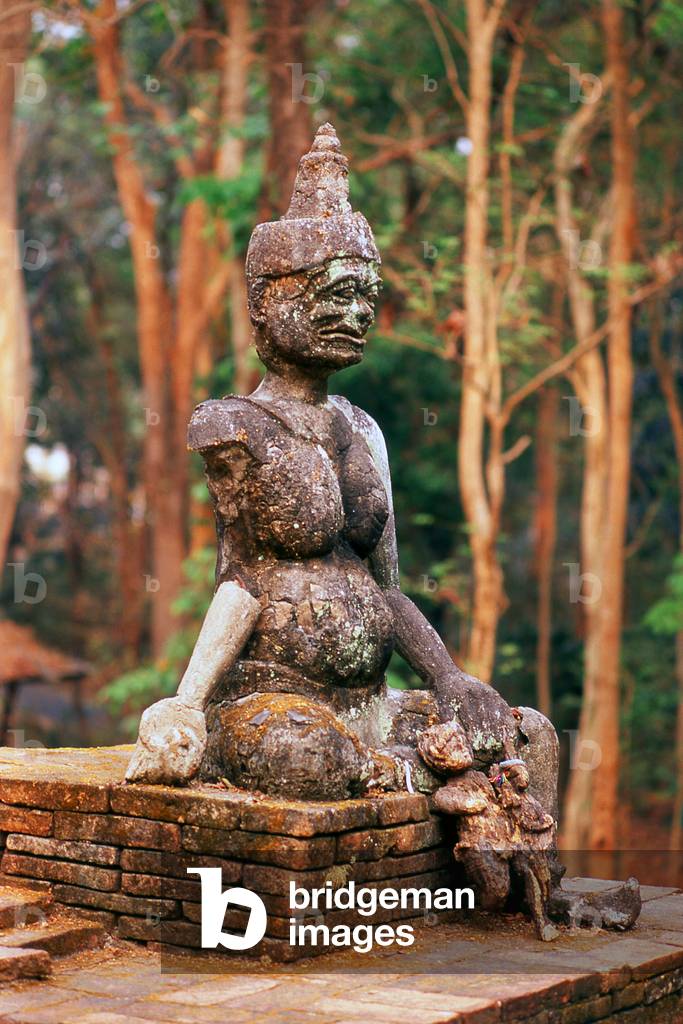 Thailand: Primitive Buddha figure in the forest at Wat Umong, Chiang Mai