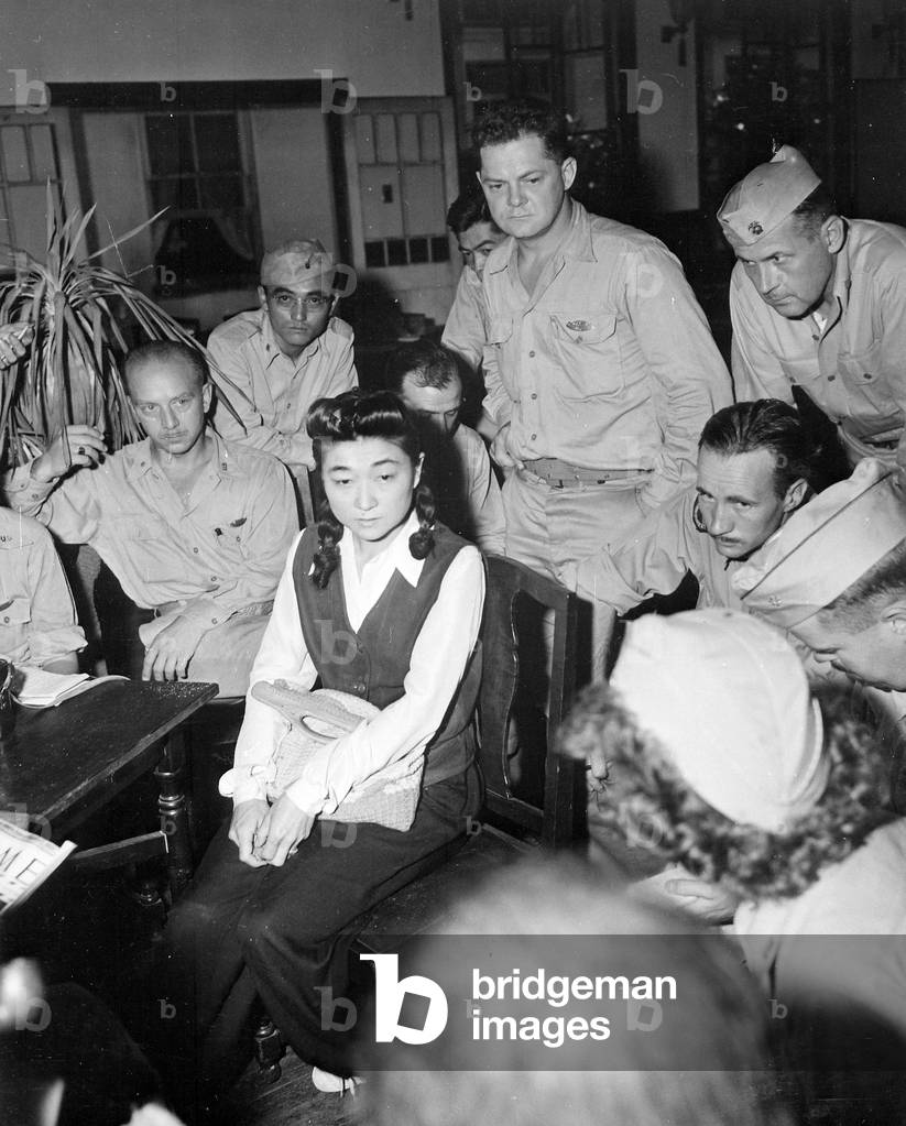 USA / Japan: Iva Toguri, better known as 'Tokyo Rose' (1916-2006), American national turned Japanese propaganda broadcaster during World War II, interviewed by US military correspondents, September 1945