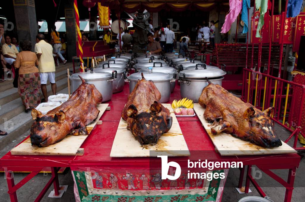 Thailand: Roasted pigs ready for the end of the festival, San Chao Chui Tui (Chinese Taoist temple), Phuket Vegetarian Festival