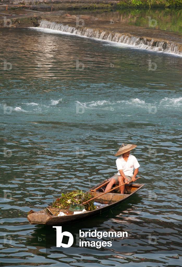 China: Boatman on the Tuo River, Fenghuang, Hunan Province
