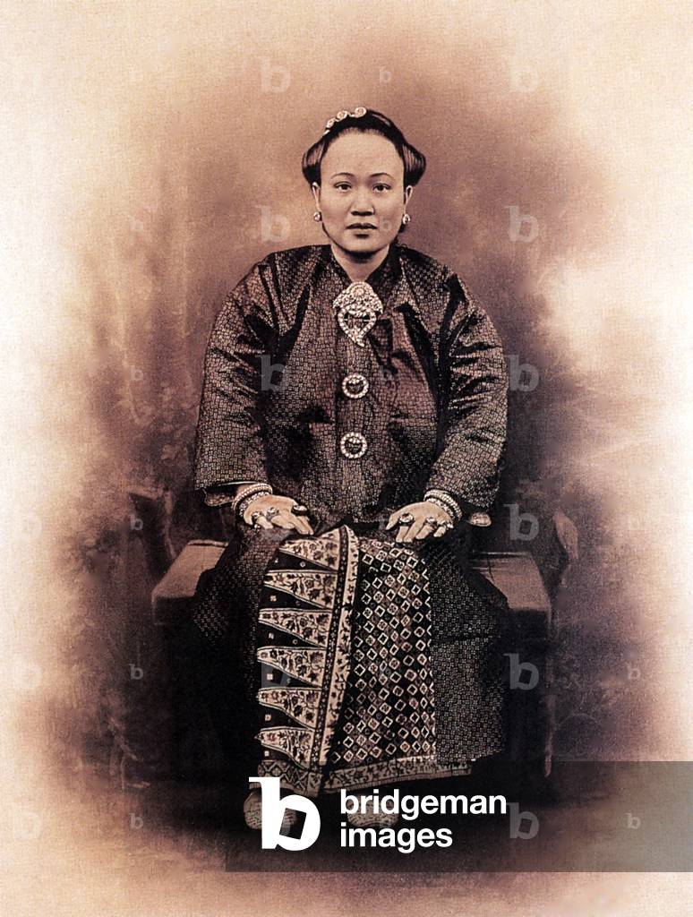Malaysia / Singapore: A Nyonya lady in formal attire, early 20th century