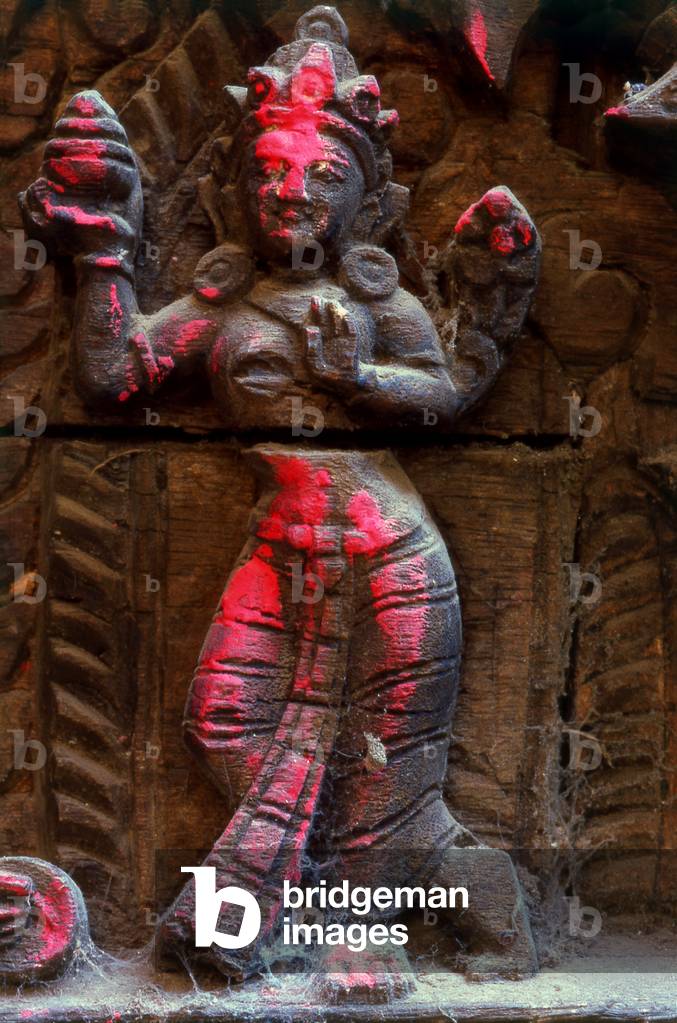 Nepal: A carved wooden image on a torana (gateway) at the Kumari Bahal, Kathmandu