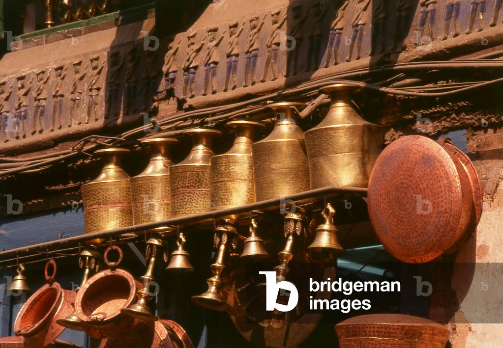 Nepal: Metalware hanging outside the Tilang Ghar (Glass House), the first private residence in Kathmandu to be permitted to have glazed windows in the 19th century (1996)