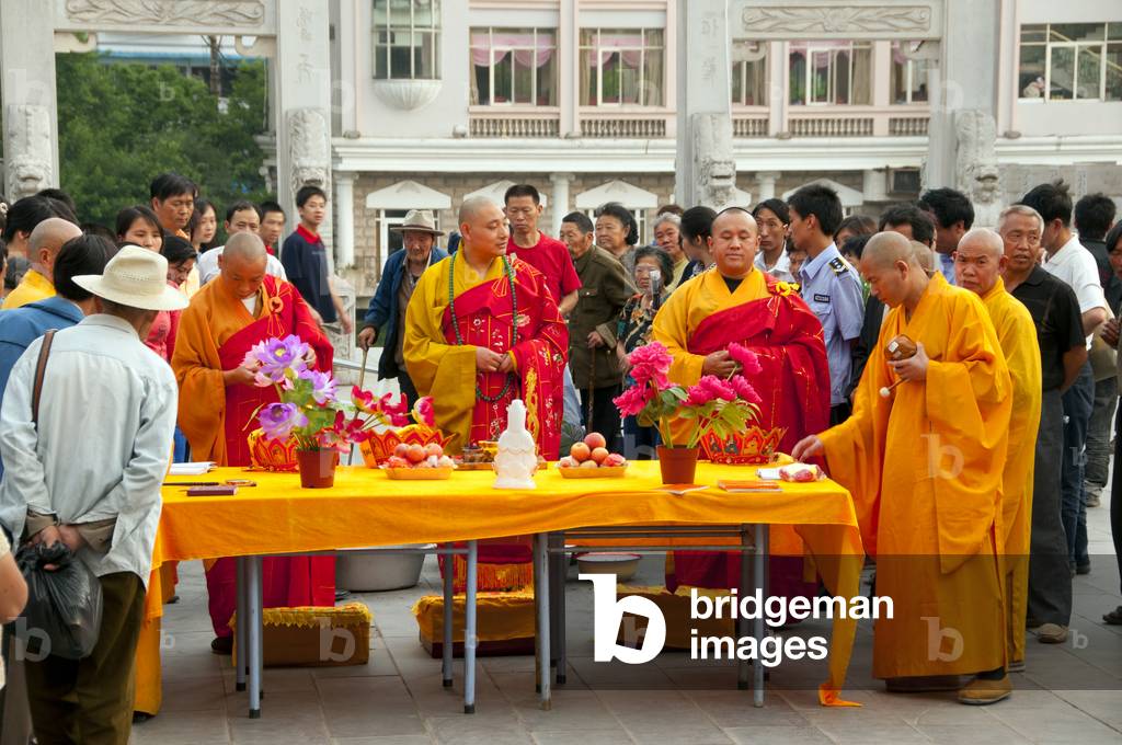 China: Elaborate late afternoon Buddhist rituals outside Ming-era Qianming Si (Qianming Temple), Guiyang, Guizhou Province