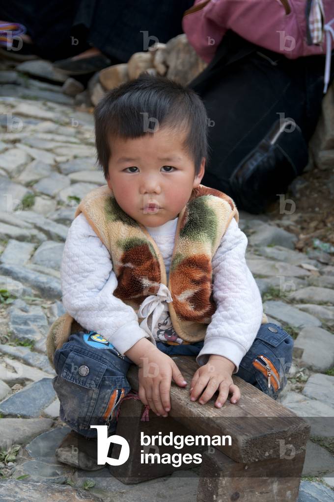 China: Young Miao boy in the village of Langde Shang, southeast of Kaili, Guizhou Province