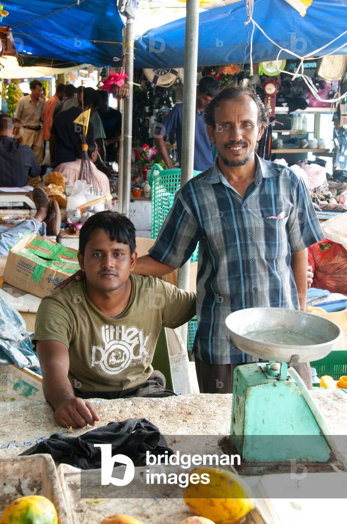 Maldives: Vendors at the end of the day in the fruit and vegetable market in the capital Male, North Male Atoll