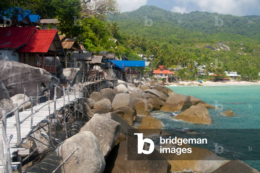 Thailand: Bungalows face the sea next to a precarious wooden walkway, Yuan Beach (Hat Yuan), Ko Phangan