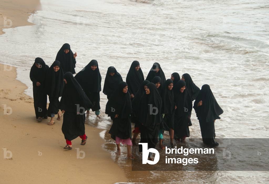 Sri Lanka: Muslim students at Galle Face at sunset, Colombo