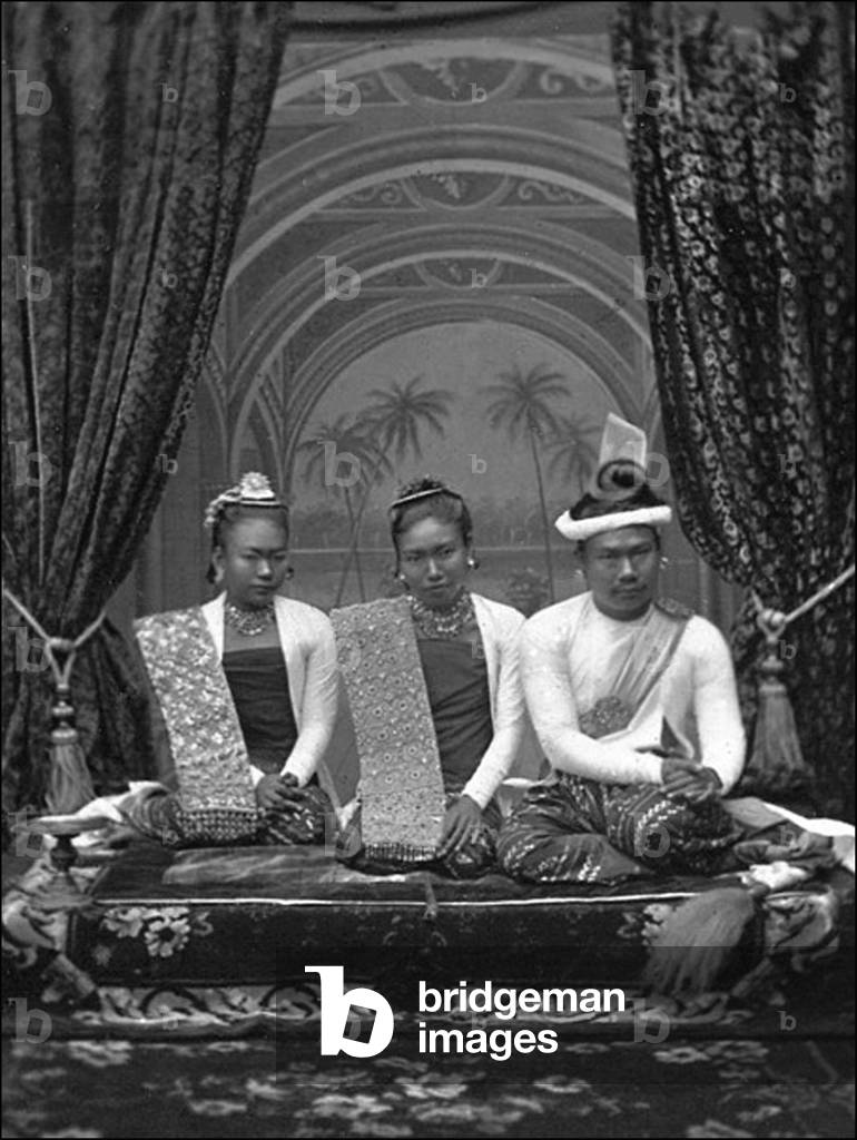 Burma / Myanmar: King Thibaw (right), Queen Supayalat (centre) and her sister Princess Supayaji (left), in the royal palace at Mandalay c.1885
