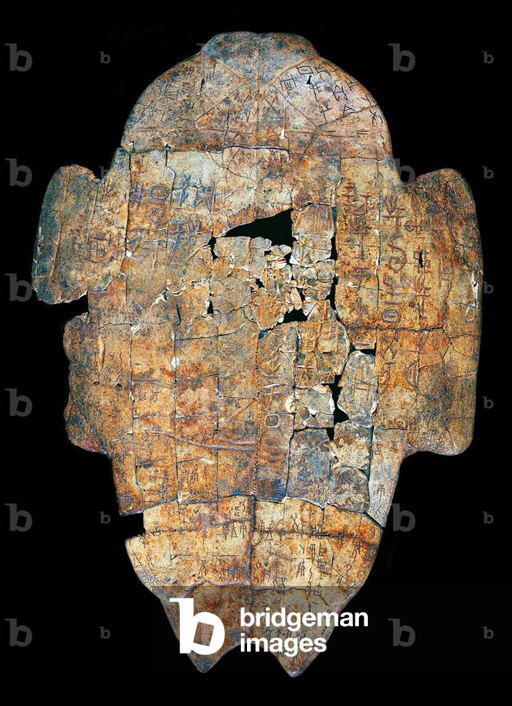 An Oracle Bone for divining the outcome of a military campaign.  Xiaotun, Anyang County, Henan Province, c. 1300 - 1050 BCE (turtle shell)