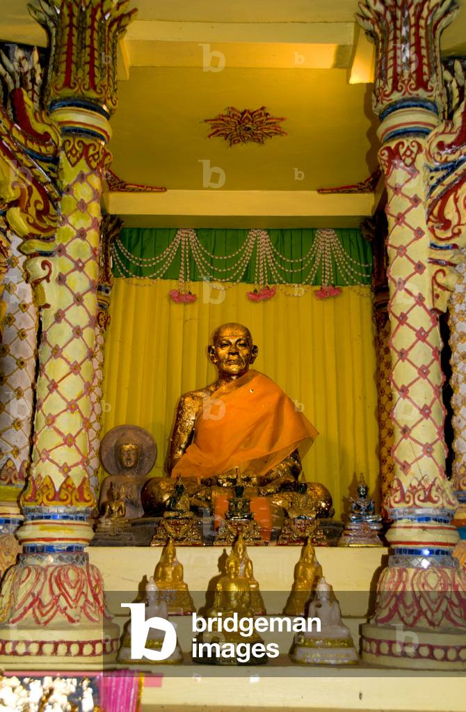 Thailand: A statue of a deceased abbot inside the cave temple Wat Tham Suwankhuha, Phang Nga Province