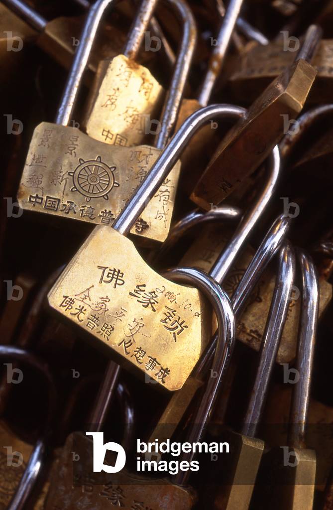 China: 'Heart Locks' used by visitors to 'lock their hearts with the Buddha' and also sometimes known as 'Locks of Love', lead up a staircase at the top end of the Puning Temple (P?níng Sì) or Temple of Universal Peace, Chengde, Hebei Province