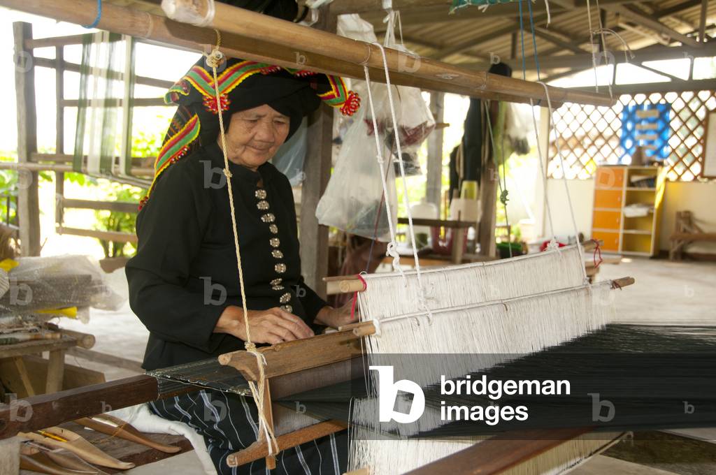 Thailand: A weaver of the 12th District Tai Dam Weaving Group, Ban Na Pa Nat Tai Dam Cultural Village, Loei Province