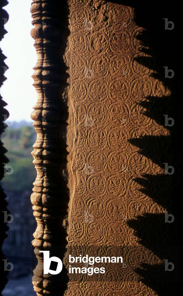 Cambodia: Window balusters high up in the central sanctuary at sunset, Angkor Wat