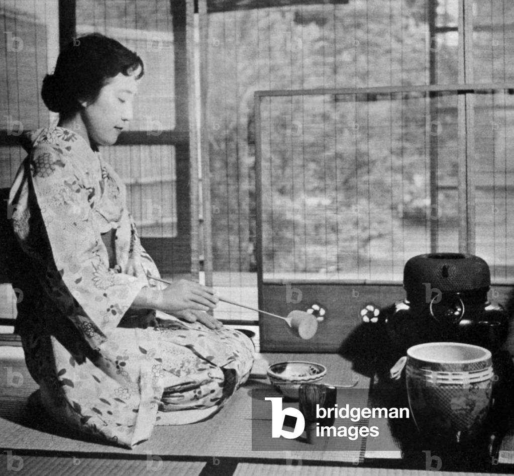 Japan: Post World War II, a kimono-clad geisha performing chanoyu (tea ceremony), 1950s.