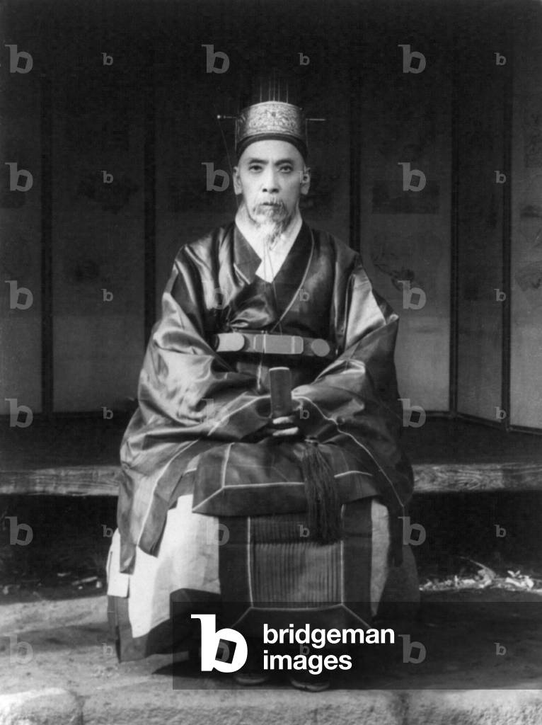 Korea: A senior mandarin or civil servant in official costume, Seoul, early 20th century