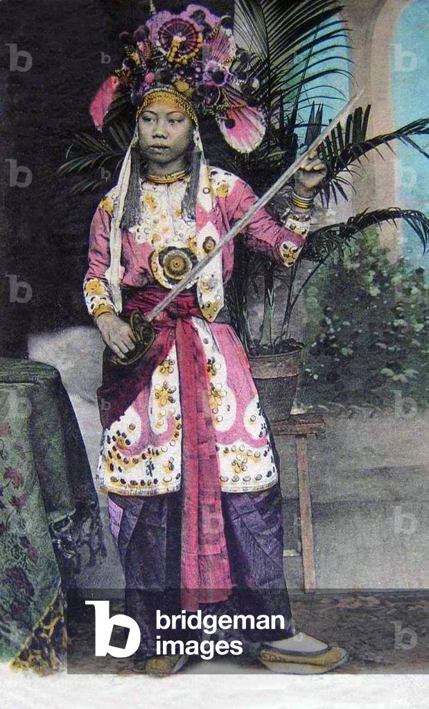 Vietnam: The leading actress in a Saigon theatre troupe, c.1905.