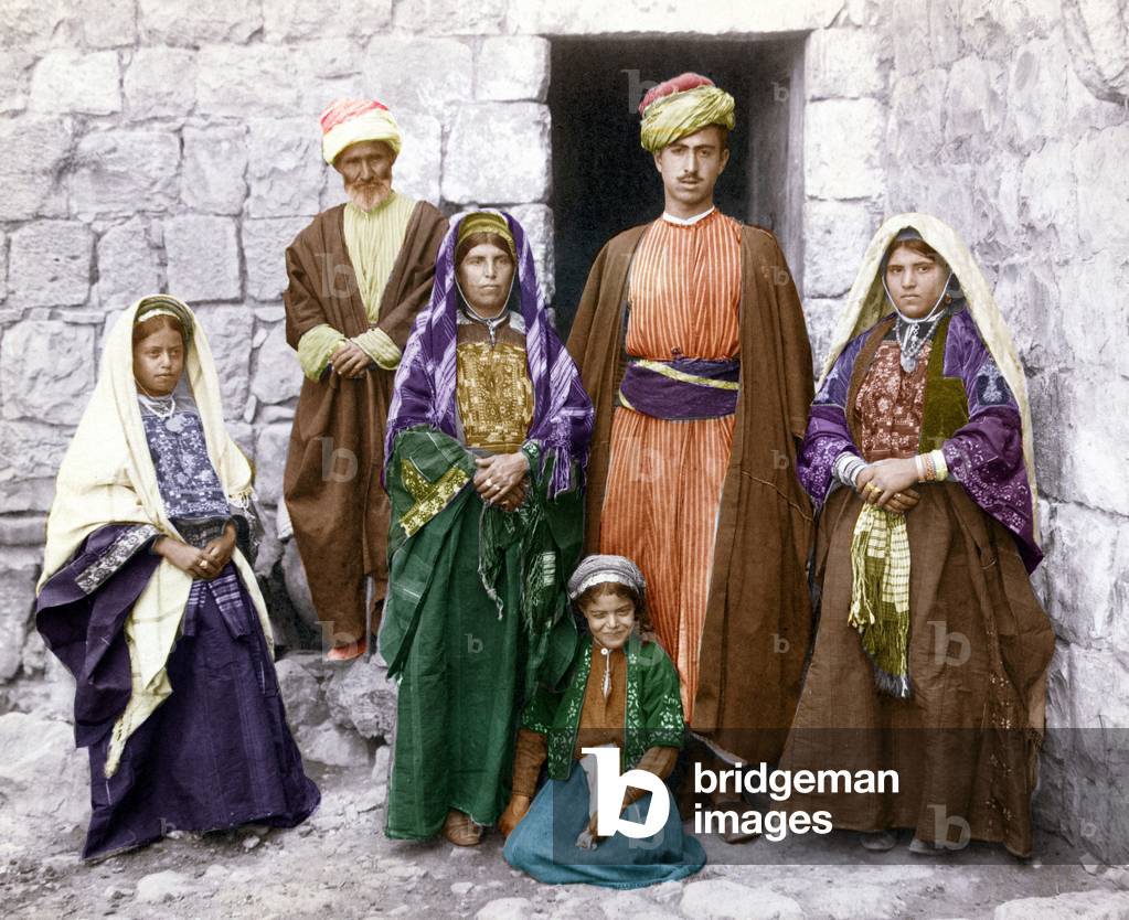 Palestine: A Palestinian family of Jerusalem. Hand coloured photographic print, c. 1900