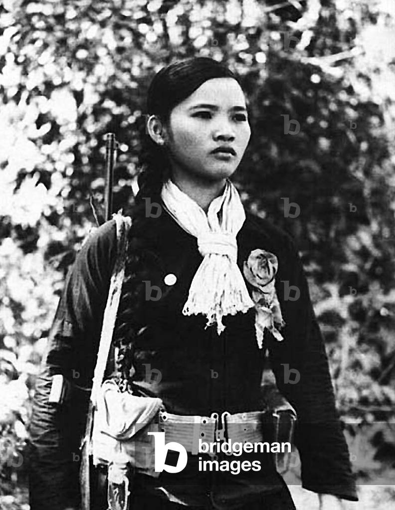 Vietnam: A female NLF (Viet Cong) guerrilla fighter, c. 1968