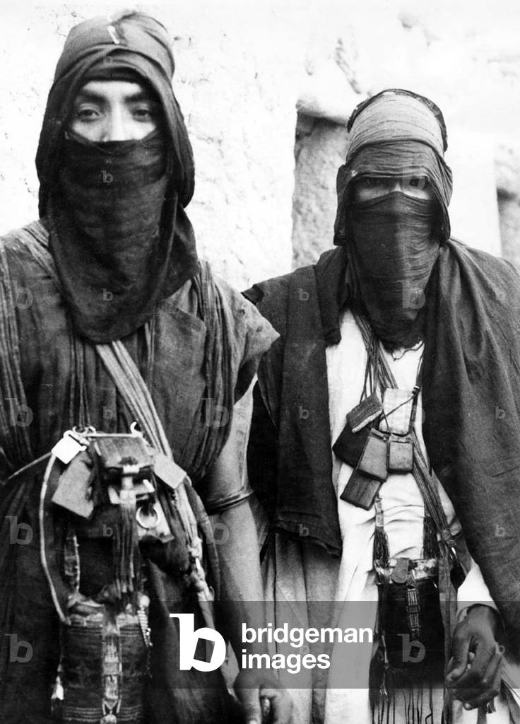 Arabia: Bedouin men in traditional dress, c. 1920