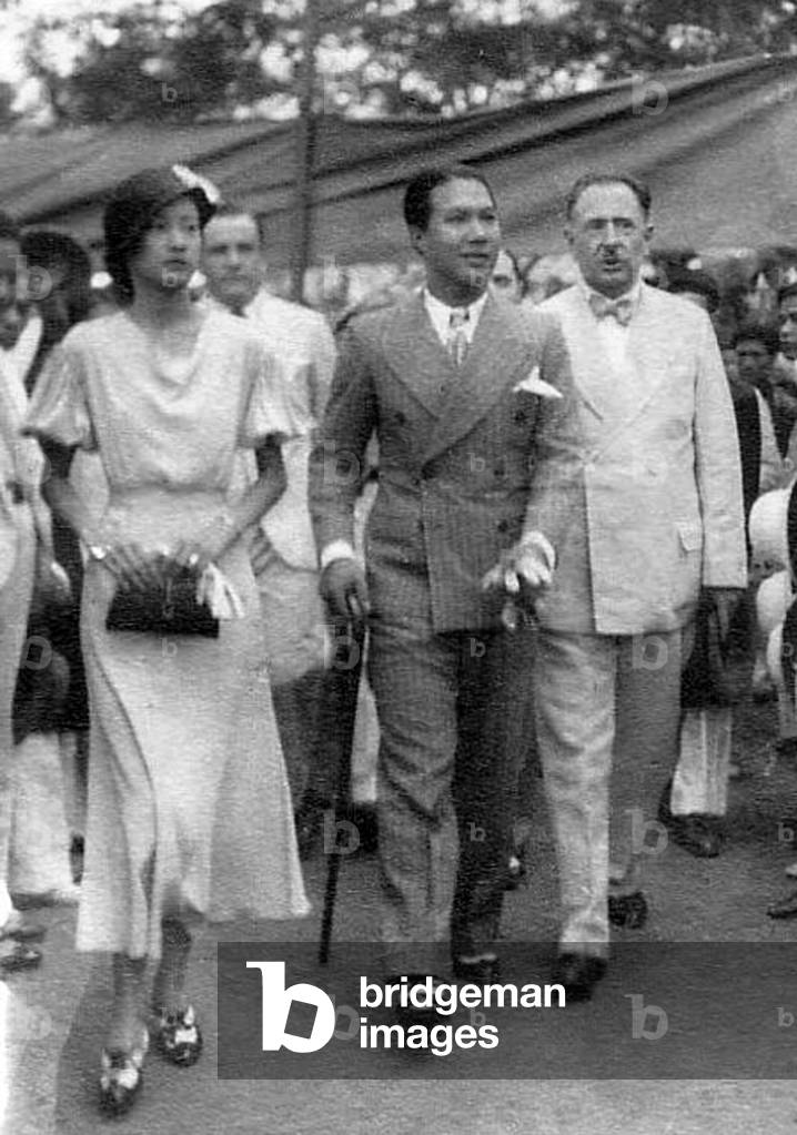 Vietnam: Empress Nam Phuong walking with Emperor Bao Dai, c. 1952