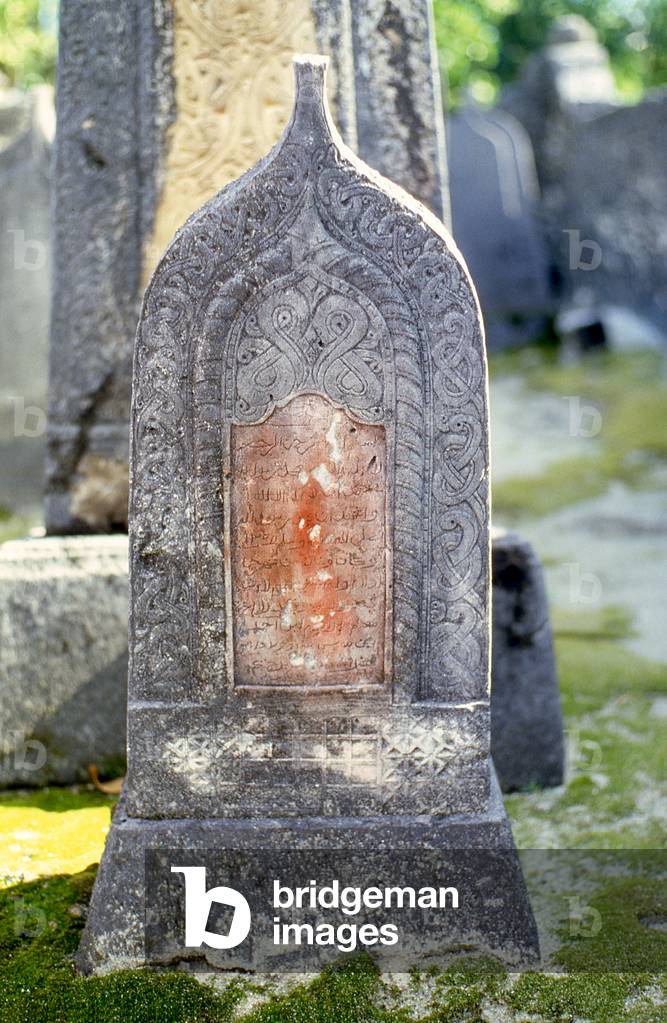 Maldives: Gravestones (pointed for men) are covered with incised designs