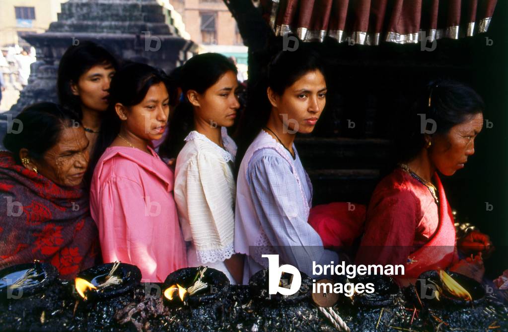 Nepal: Pilgrims visiting Swayambhunath (Monkey Temple), Kathmandu Valley