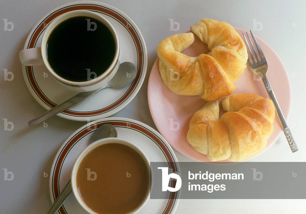 Laos: Coffee and croissants - the ubiquitous 'continental breakfast', here served in sleepy Vientiane