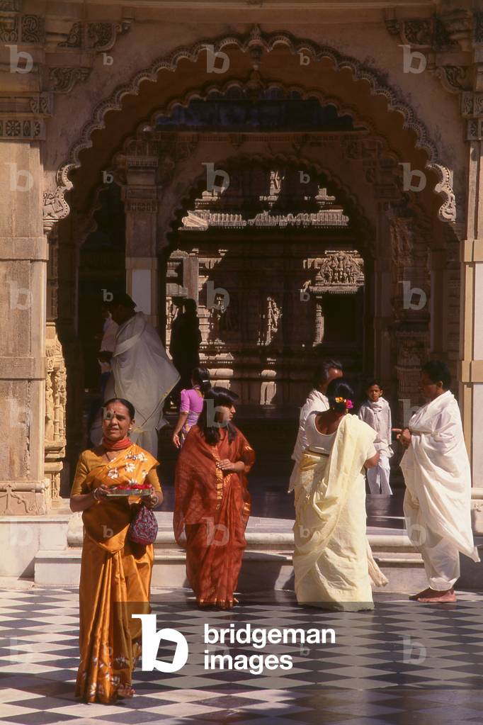 India: Pilgrims at the Shri Adishwara Temple, one of the holy Jain Palitana temples (11th to 16th Century CE) in the Shatrunjaya Hills, Gujarat (2004) (photo)