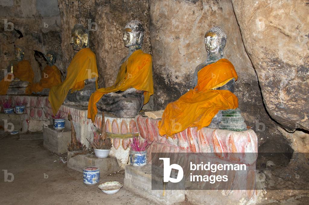 Thailand: Buddha figures in the cave at Wat Khao Tham Khan Kradai, Prachuap Khiri Khan Province