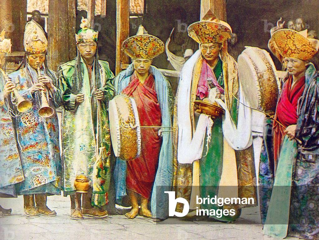 China / Tibet: A group of traditional musicians at a monastery, late 19th century